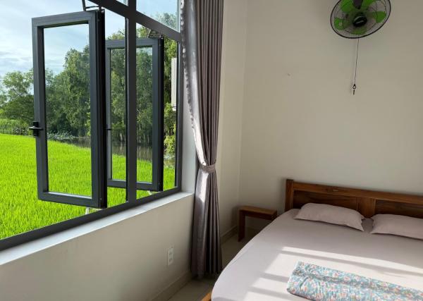 Hương Tràm Homestay, Book Hostel / Vandrerhjem Hoteller i Mekong Delta med parkering, Parkering