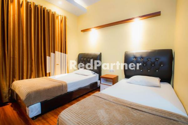 Hatta Guest House Syariah near Hayam Wuruk Jelutung Mitra RedDoorz, Book Pension Jambi Jambi