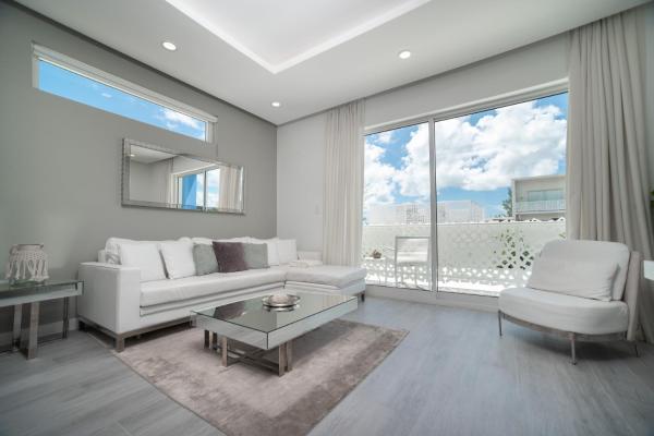 Luxury 1 bed apartment near Seven Mile Beach at The Grove - Villa Deluxe, Book Lejlighed Hoteller i Seven Mile Beach med pool, Swimmingpool