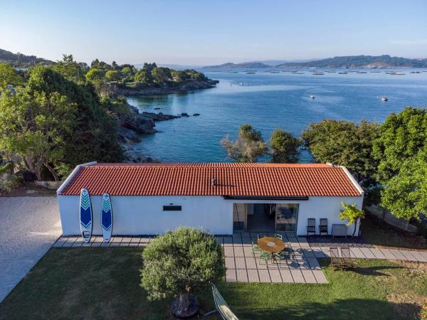 A Factoria Beach House by Prishomes, Book Feriehus  