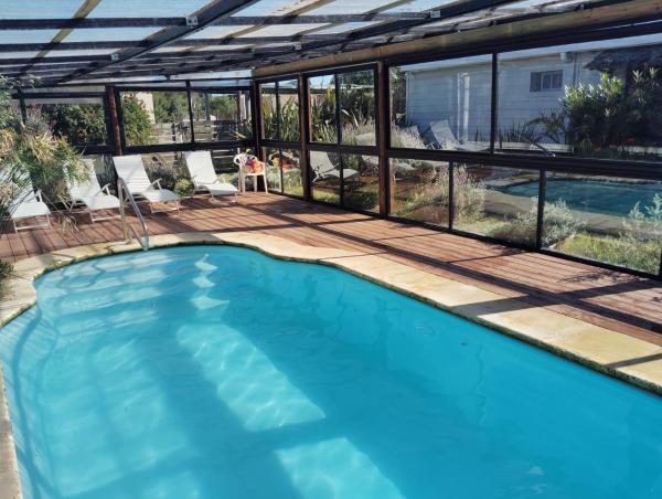 Noctilucas en PuntaNegra, cerquita de la playa y piscina climatizada, Book  Hoteller i Maldonado med pool, Swimmingpool