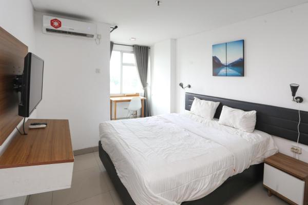 RedLiving Apartemen Enviro Cikarang - Stars Rooms, Book  Billige hoteller i Cibeber