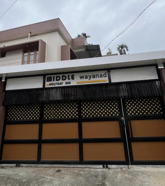 MIDDLE WAYANAD HOLYDAY Inn, Book   