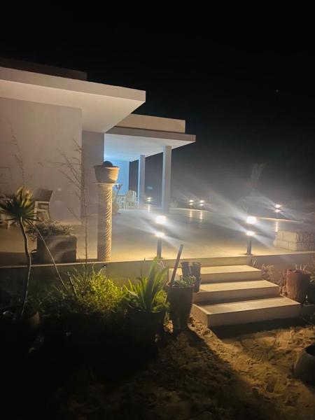 Beach house wing in kerkennah island. Fully equipped place for 4 guests and peaceful relaxing stay. Calm sea and beautiful sun rise that can be enjoyed straight on the beach or from the house terrace., Book  Ouled Yaneg Sfax