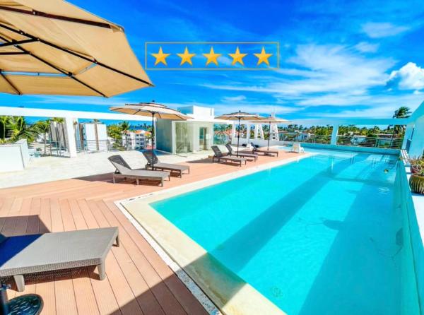 Caribbean WAVE DREAM BEACH Studios HOTEL with WiFi ROOFTOP POOL & SPA, Book  Punta Cana Den Dominikanske Republik