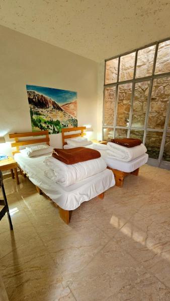 Wadi Dana Lodge - نزل وادي ضانا, Book  Ḑānā Petra