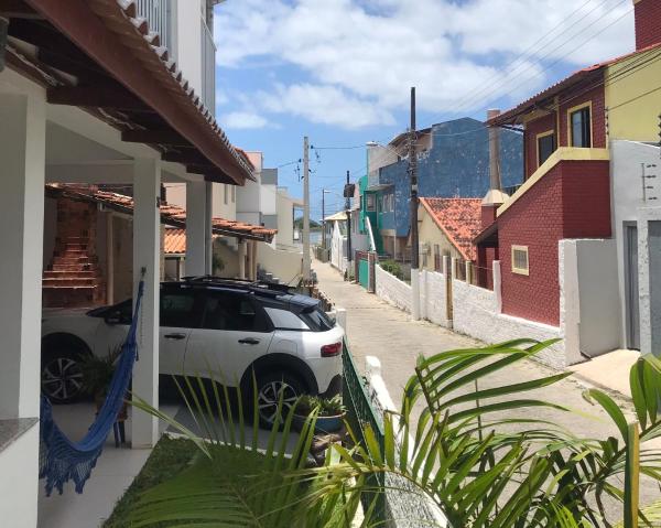 Casa 50 metros praia Armação e Matadeiro Floripa!!35, Book Feriehus Florianopolis hoteller med parkering, Parkering