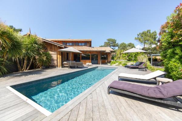Villa Palombes au Cap Ferret charming villa with swimming pool, Book  Hoteller i Aquitaine med pool, Swimmingpool