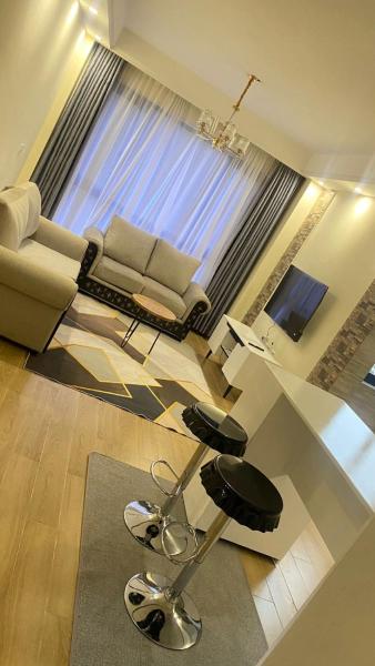 spacious executive one bedroom apartments with breathtaking city views swimming pool ,well equipped gym ,child playground and ample parking space, Book  Nairobi hoteller med pool, Swimmingpool
