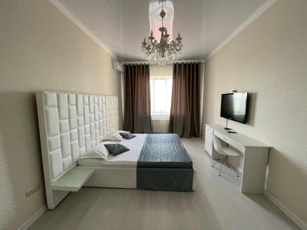 Апартаменты гостиничного типа в центре города ЖК Арман, Book Lejlighed Aktobe Region hoteller med parkering, Parkering