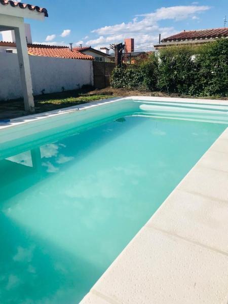 Casa en Villa Carlos Paz con Pileta , Quincho y Jardín a Pasos del Centro, Book Feriehus Villa Carlos Paz 