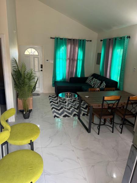 Home in Portmore Phoenix Village, Book  Portmore Jamaica