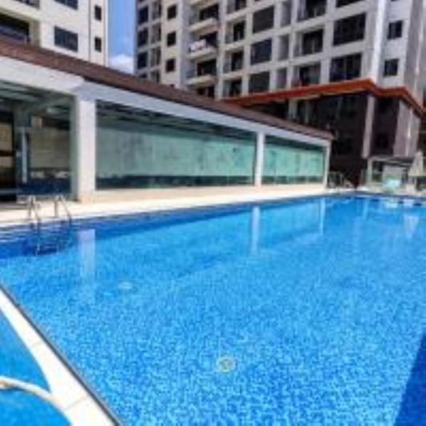 luxe living one bedroom apartment with heated swimming pool fully equipped gym ample parking space and relaxing rooftop with amazing city views, Book Lejlighed Nairobi Nairobi