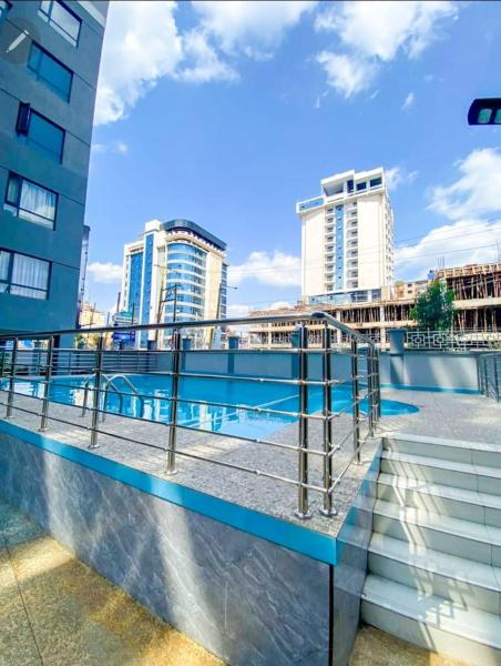 classy executive one bedroom apartment with swimming pool, fully equipped gym ample parking space and amazing scenic views, Book Lejlighed Nairobi Nairobi