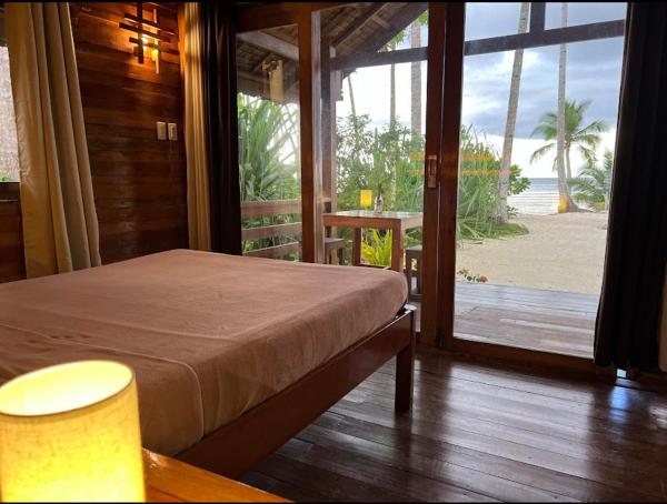 Camp Olli Beach Villas, Book  Dapa Siargao Island