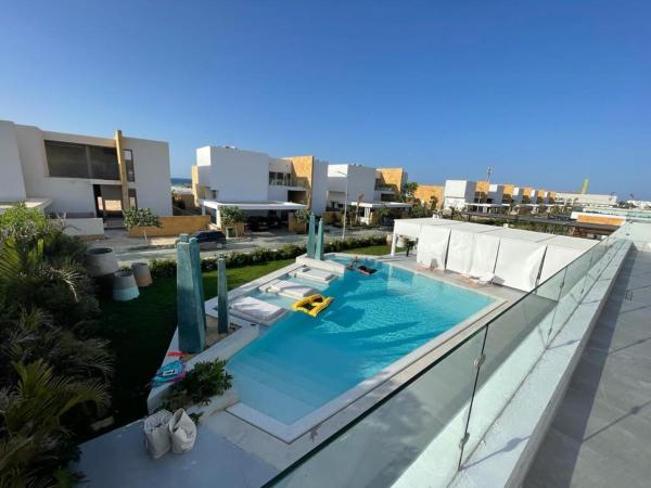 Seashell 2nd row sea Villa, Book  North Coast hoteller med pool, Swimmingpool