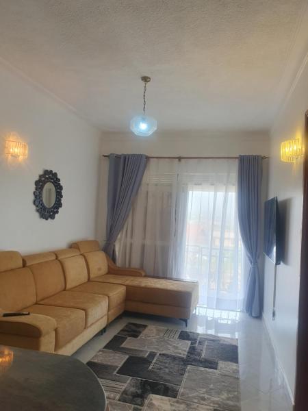 Two Bedrooms Apartment, located between kajjansi and kitende, with one bathroom, a living room, fully furnished kitchen, patio, free wifi, free parking space, Book Lejlighed Busiiro Lejligheder, Lejlighed