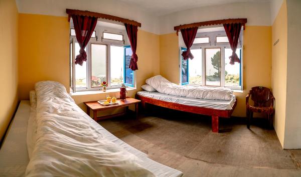 Snow Lion Eco Lodge Khiraule, Book  Gudel Nepal